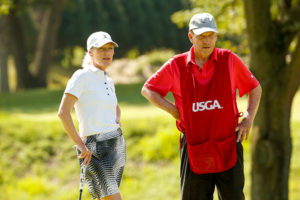 Lara Tennant with her caddie/father, George Mack, at the 13th hole during the final round at the 2019 U.S. Senior Women's Amateur.