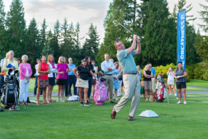 A hands-on guy, Mike Whan shows his game by hitting a shot during a contest at the range at Sahalee Country Club prior to the 2016 KPMG Women’s PGA Championship. (Photo by Rob Perry