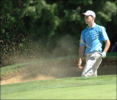 Nick Taylor, hitting out of a bunker